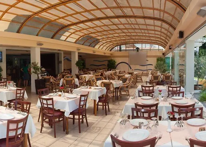 Poseidonia Aparthotel 4*